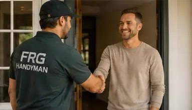 FRG Handyman technician shaking hands with a homeowner